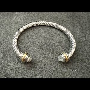 Brand new adjustable cable bracelet with clear crystal.